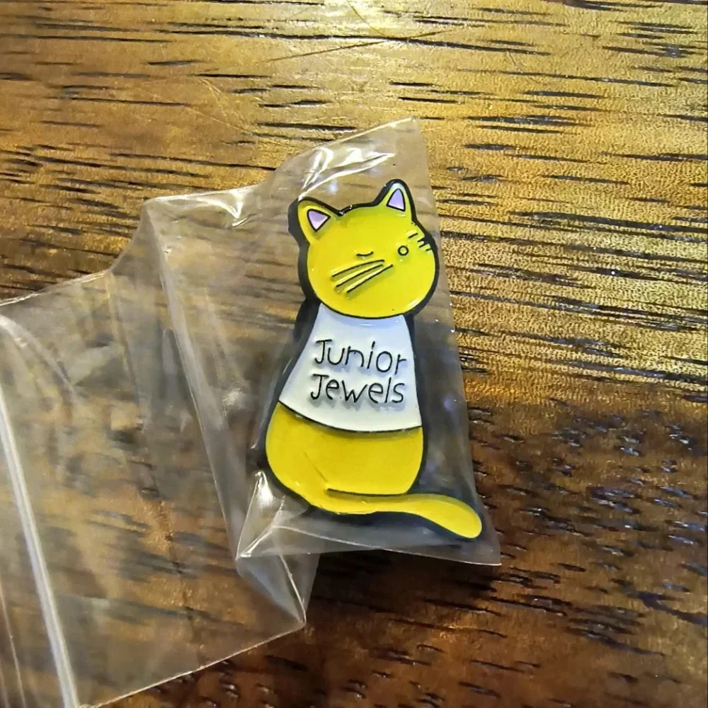 Yellow cartoon cat white shirt Junior Jewels enamel pin hat clothes bag cap
